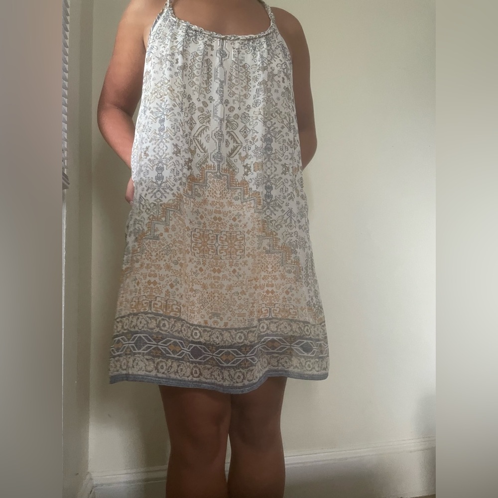 - Size small dress from Hollister
- Blue, gold, yellow, and white colored
